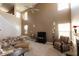 Bright living room with soaring ceilings, neutral paint, plush carpet, and an abundance of natural light at 1884 Misty Lake Dr, Indianapolis, IN 46260