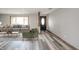 Bright living room featuring hardwood floors, and neutral decor at 1908 Roundhill Dr, Anderson, IN 46013