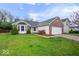 Charming single-story home featuring a manicured front lawn and an attached two-car garage at 19516 Golden Meadow Way, Noblesville, IN 46060