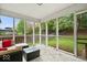 Relaxing screened porch with comfortable seating, perfect for enjoying the outdoors at 19516 Golden Meadow Way, Noblesville, IN 46060