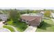 Birds eye view of the single Gathering home, showcasing the manicured lawn, and surrounding landscape at 2102 Coldwater Cir, Indianapolis, IN 46239