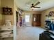 Cozy bedroom with a ceiling fan, built in display case, and ample space for relaxation at 2143 N Graham Ave, Indianapolis, IN 46218