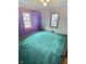Cozy bedroom with dual windows and vintage wallpaper at 2309 Pennsylvania St, Columbus, IN 47201
