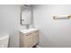 Updated bathroom featuring a modern vanity with ample storage space, a large mirror, and good lighting at 2333 Calhoun St, Indianapolis, IN 46203