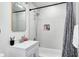 Bathroom featuring white subway tile, updated fixtures, and a glass shower door, great for modern living at 2333 Calhoun St, Indianapolis, IN 46203