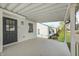 Spacious covered porch offering neighborhood views and an inviting entrance at 2333 Calhoun St, Indianapolis, IN 46203