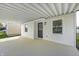 Inviting covered porch featuring a gray front door, perfect for relaxing outdoors at 2333 Calhoun St, Indianapolis, IN 46203