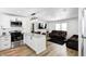 Stylish open kitchen with stainless appliances, white cabinets, and island seating at 2333 Calhoun St, Indianapolis, IN 46203