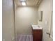 Cozy bathroom featuring a small sink and walk-in shower at 274 Leeds Ave, Indianapolis, IN 46201