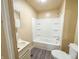 Neutral bathroom with vanity, tub, and shower combination at 274 Leeds Ave, Indianapolis, IN 46201