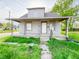 Charming two-story home with a covered porch and decorative iron railings at 274 Leeds Ave, Indianapolis, IN 46201
