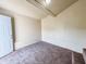 Cozy room with a carpeted floor, neutral walls, close to the entrance door through small stairs at 274 Leeds Ave, Indianapolis, IN 46201
