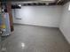 Clean basement space with painted walls and floor, great for storage or future finishing at 2819 W 16Th St, Indianapolis, IN 46222
