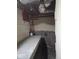 Unfinished basement with block walls, exposed ductwork, and an area for storage or future customization at 2819 W 16Th St, Indianapolis, IN 46222