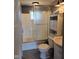 Updated bathroom features a shower and vanity at 2819 W 16Th St, Indianapolis, IN 46222