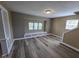 Open living room with built-in window seat and storage offers plenty of natural light at 2819 W 16Th St, Indianapolis, IN 46222