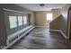 Comfortable living room with built-in window seat offers plenty of natural light at 2819 W 16Th St, Indianapolis, IN 46222