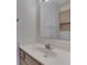 Bathroom featuring a single sink vanity, large mirror and natural toned cabinets at 3427 Brunswick Ave, Indianapolis, IN 46227