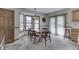 Bright dining area with a bay window, a table set for six, and natural light at 3427 Brunswick Ave, Indianapolis, IN 46227