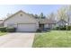 Charming single-story home with a well-manicured lawn and a two-car garage, showcasing curb appeal at 3427 Brunswick Ave, Indianapolis, IN 46227