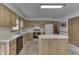 Charming kitchen featuring an island, plenty of counter space, and wooden cabinets at 3427 Brunswick Ave, Indianapolis, IN 46227