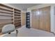 Office featuring neutral paint, built in shelves and cabinets, and wood trim at 3427 Brunswick Ave, Indianapolis, IN 46227