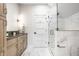 Modern bathroom with stylish vanity, glass shower, and marble flooring at 3868 N Park Ave, Indianapolis, IN 46205