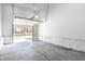 View of the spacious garage with an open door at 3868 N Park Ave, Indianapolis, IN 46205