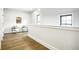 Bright hallway with seating area and natural light from nearby windows at 3868 N Park Ave, Indianapolis, IN 46205