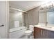 Contemporary bathroom showcasing a shower over tub combination and modern fixtures at 4000 N Meridian St # Apt 15J, Indianapolis, IN 46208