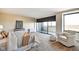 Sun-filled bedroom featuring a sliding glass door to a balcony at 4000 N Meridian St # Apt 15J, Indianapolis, IN 46208