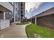 Landscaped courtyard featuring a walkway, lawn, and trees, providing a serene outdoor space at 4000 N Meridian St # Apt 15J, Indianapolis, IN 46208