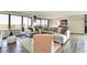 Spacious living room with large windows, stylish furniture, and hardwood flooring at 4000 N Meridian St # Apt 15J, Indianapolis, IN 46208