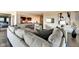 Contemporary living room with an open layout, hardwood floors, and modern decor and appliances at 4000 N Meridian St # Apt 15J, Indianapolis, IN 46208
