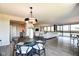 Open-concept living space featuring modern furnishings, hardwood floors, and natural light throughout at 4000 N Meridian St # Apt 15J, Indianapolis, IN 46208