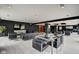 Relaxing lounge area with comfortable seating, a dining table, and sleek modern decor at 4000 N Meridian St # Apt 15J, Indianapolis, IN 46208