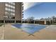 Outdoor pool with a pool cover and a view of the building exterior at 4000 N Meridian St # Apt 15J, Indianapolis, IN 46208