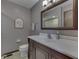 Bathroom featuring a wood vanity, drawers and a toilet at 4037 Hazy Ln, Greenwood, IN 46142