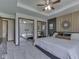 Comfortable bedroom featuring a tray ceiling and mirrored closet at 4037 Hazy Ln, Greenwood, IN 46142