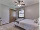 Cozy bedroom with carpeted floor, closet and a bright window overlooking a well-kept yard at 4037 Hazy Ln, Greenwood, IN 46142
