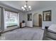 Cozy dining room features a view to the backyard, neutral colored walls and carpet at 4037 Hazy Ln, Greenwood, IN 46142