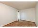 Spacious bedroom with neutral walls, carpet flooring, and a window with natural light at 4651 Monterey Dr, Columbus, IN 47203
