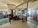 Charming dining area with a desk, shelves, and view into the living room, ideal for Gathering meals at 4726 Breckenridge Dr, Columbus, IN 47203