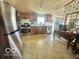 Efficient kitchen with stainless steel appliances, wood cabinets, and a cozy atmosphere for cooking and dining at 4726 Breckenridge Dr, Columbus, IN 47203
