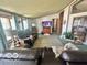 Spacious living room with comfortable seating, a patterned rug, and abundant natural light, perfect for relaxing at 4726 Breckenridge Dr, Columbus, IN 47203