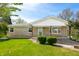 Inviting home with a well-manicured lawn and charming front entrance at 5079 S Lick Creek Rd, Morgantown, IN 46160