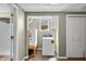 Functional laundry room with a washer and dryer, and storage space at 5079 S Lick Creek Rd, Morgantown, IN 46160
