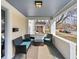 Inviting front porch with ample seating, perfect for relaxing and entertaining guests at 5252 N College Ave, Indianapolis, IN 46220