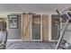 Finished basement exercise room with wood doors, gray walls, and neutral flooring at 5335 Honey Comb Ln, Indianapolis, IN 46221