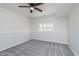 A bedroom with carpet flooring with natural light from a large window at 5622 Imperial Woods Cir, Indianapolis, IN 46224